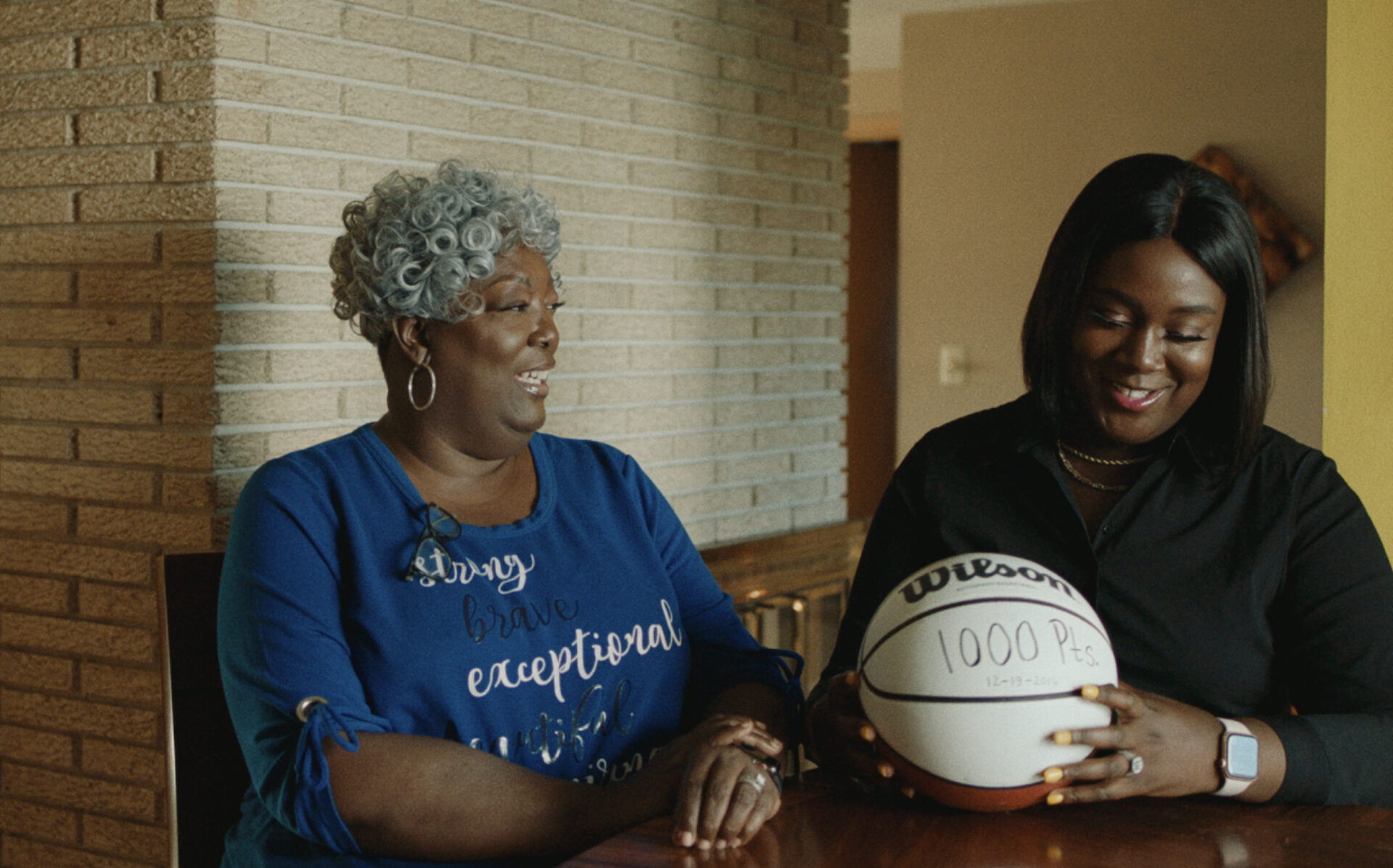 two women with a basketball